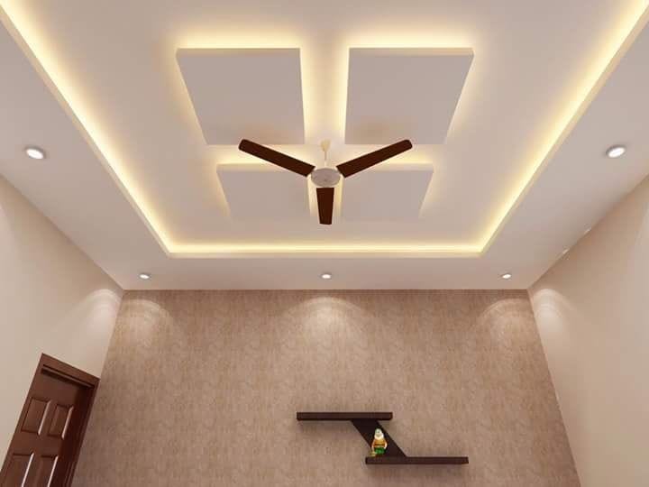 Professional painters from Ajay Painting Services working on interior wall painting with clean and precise finishing